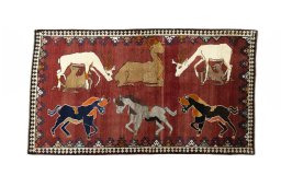 Full view of 2000s Persian Gabbeh rug from Iran / Persia, 215 × 121 cm in Red tones