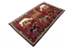 Corner detail of 2000s Persian Gabbeh rug showing border pattern and Wool pile