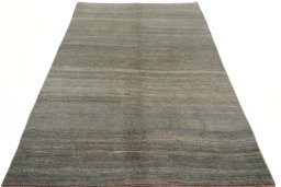 Surface texture of New Persian Gabbeh rug with natural Wool and intricate pattern