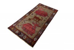 Corner detail of 2000s Persian Gabbeh rug showing border pattern and Wool pile