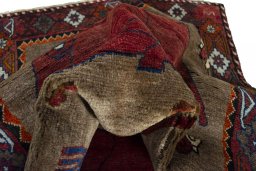 Full view of 2000s Persian Gabbeh rug from Iran / Persia, 204 × 107 cm in Brown tones
