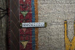 Close-up detail of 2000s Persian Gabbeh rug from Iran / Persia showing Wool weave