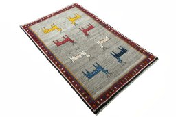 Close-up detail of 2000s Persian Gabbeh rug from Iran / Persia showing Wool weave