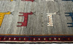 Close-up detail of 2000s Persian Gabbeh rug from Iran / Persia showing Wool weave