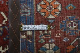 Close-up detail of 2000s Persian Gabbeh rug from Iran / Persia showing Wool weave