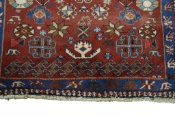 Central medallion detail of 2000s Persian Gabbeh rug from Iran / Persia