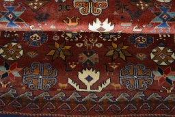 Full view of 2000s Persian Gabbeh rug from Iran / Persia, 152 × 93 cm in Red tones