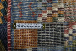 Close-up detail of 2000s Persian Gabbeh rug from Iran / Persia showing Wool weave
