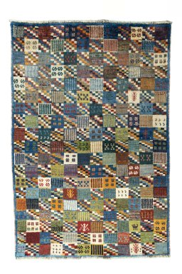 Full view of 2000s Persian Gabbeh rug from Iran / Persia, 189 × 127 cm in Multi Color tones
