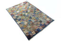 Close-up detail of 2000s Persian Gabbeh rug from Iran / Persia showing Wool weave