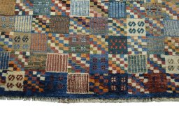 Central medallion detail of 2000s Persian Gabbeh rug from Iran / Persia