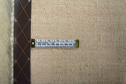 Corner detail of New Persian Gabbeh rug showing border pattern and Wool pile