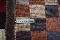 Close-up detail of 2000s Persian Gabbeh rug from Iran / Persia showing Wool weave