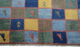 Central medallion detail of 2000s Persian Gabbeh rug from Iran / Persia