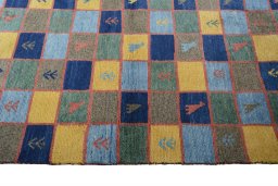 Close-up detail of 2000s Persian Gabbeh rug from Iran / Persia showing Wool weave