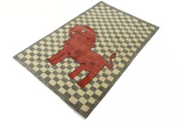 Corner detail of New Persian Gabbeh rug showing border pattern and Wool pile
