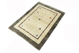 Corner detail of New Persian Gabbeh rug showing border pattern and Wool pile