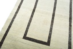 Backside of handmade New Persian Gabbeh rug showing knot structure and weave density