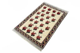 Corner detail of 2000s Persian Gabbeh rug showing border pattern and Wool pile