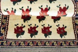 Full view of 2000s Persian Gabbeh rug from Iran / Persia, 133 × 86 cm in Beige tones