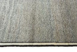 Close-up detail of 2000s Persian Gabbeh rug from Iran / Persia showing Wool weave