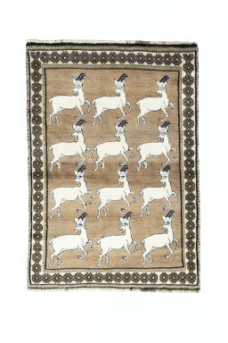Full view of 2000s Persian Gabbeh rug from Iran / Persia, 146 × 103 cm in Brown tones
