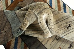 Close-up detail of 2000s Persian Gabbeh rug from Iran / Persia showing Wool weave