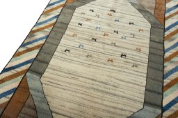Backside of handmade 2000s Persian Gabbeh rug showing knot structure and weave density