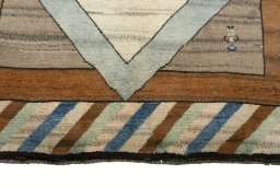 Close-up detail of 2000s Persian Gabbeh rug from Iran / Persia showing Wool weave