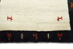 Central medallion detail of 2000s Persian Gabbeh rug from Iran / Persia