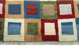 Central medallion detail of 2000s Persian Gabbeh rug from Iran / Persia