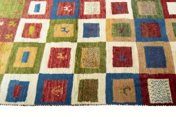 Close-up detail of 2000s Persian Gabbeh rug from Iran / Persia showing Wool weave