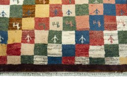 Central medallion detail of 2000s Persian Gabbeh rug from Iran / Persia