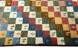 Close-up detail of 2000s Persian Gabbeh rug from Iran / Persia showing Wool weave