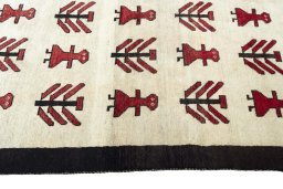 Close-up detail of 2000s Persian Gabbeh rug from Iran / Persia showing Wool weave