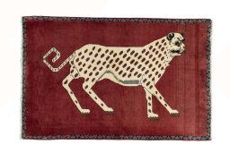 Full view of 2000s Persian Gabbeh rug from Iran / Persia, 140 × 90 cm in Red tones