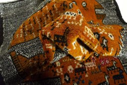 Corner detail of 2000s Persian Gabbeh rug showing border pattern and Wool pile