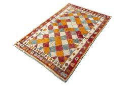 Corner detail of 2000s Persian Gabbeh rug showing border pattern and Wool pile