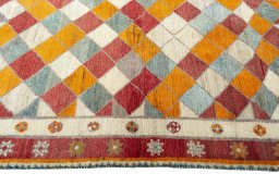 Close-up detail of 2000s Persian Gabbeh rug from Iran / Persia showing Wool weave