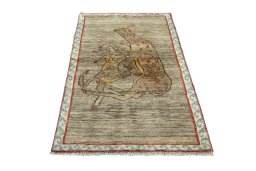 Surface texture of 2000s Persian Gabbeh rug with natural Wool and intricate pattern