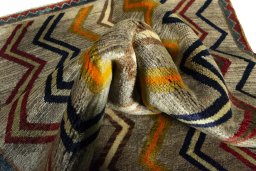 Close-up detail of 2000s Persian Gabbeh rug from Iran / Persia showing Wool weave