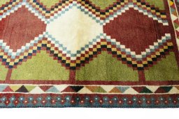 Close-up detail of 2000s Persian Gabbeh rug from Iran / Persia showing Wool weave