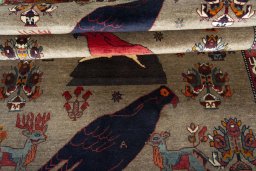 Full view of 2000s Persian Gabbeh rug from Iran / Persia, 253 × 145 cm in Brown tones