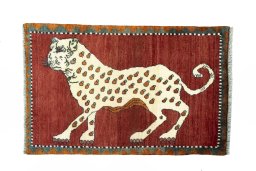 Full view of 2000s Persian Gabbeh rug from Iran / Persia, 125 × 80 cm in Red tones