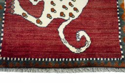 Central medallion detail of 2000s Persian Gabbeh rug from Iran / Persia