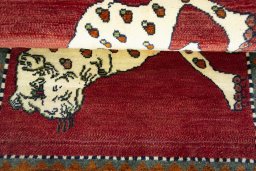 Full view of 2000s Persian Gabbeh rug from Iran / Persia, 125 × 80 cm in Red tones