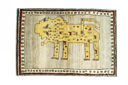 Full view of 2000s Persian Gabbeh rug from Iran / Persia, 150 × 100 cm in Beige tones