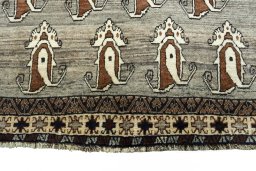 Backside of handmade 2000s Persian Gabbeh rug showing knot structure and weave density