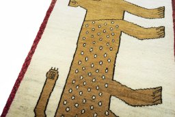 Backside of handmade 2000s Persian Gabbeh rug showing knot structure and weave density