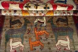 Full view of 2000s Persian Gabbeh rug from Iran / Persia, 284 × 142 cm in Multi Color tones